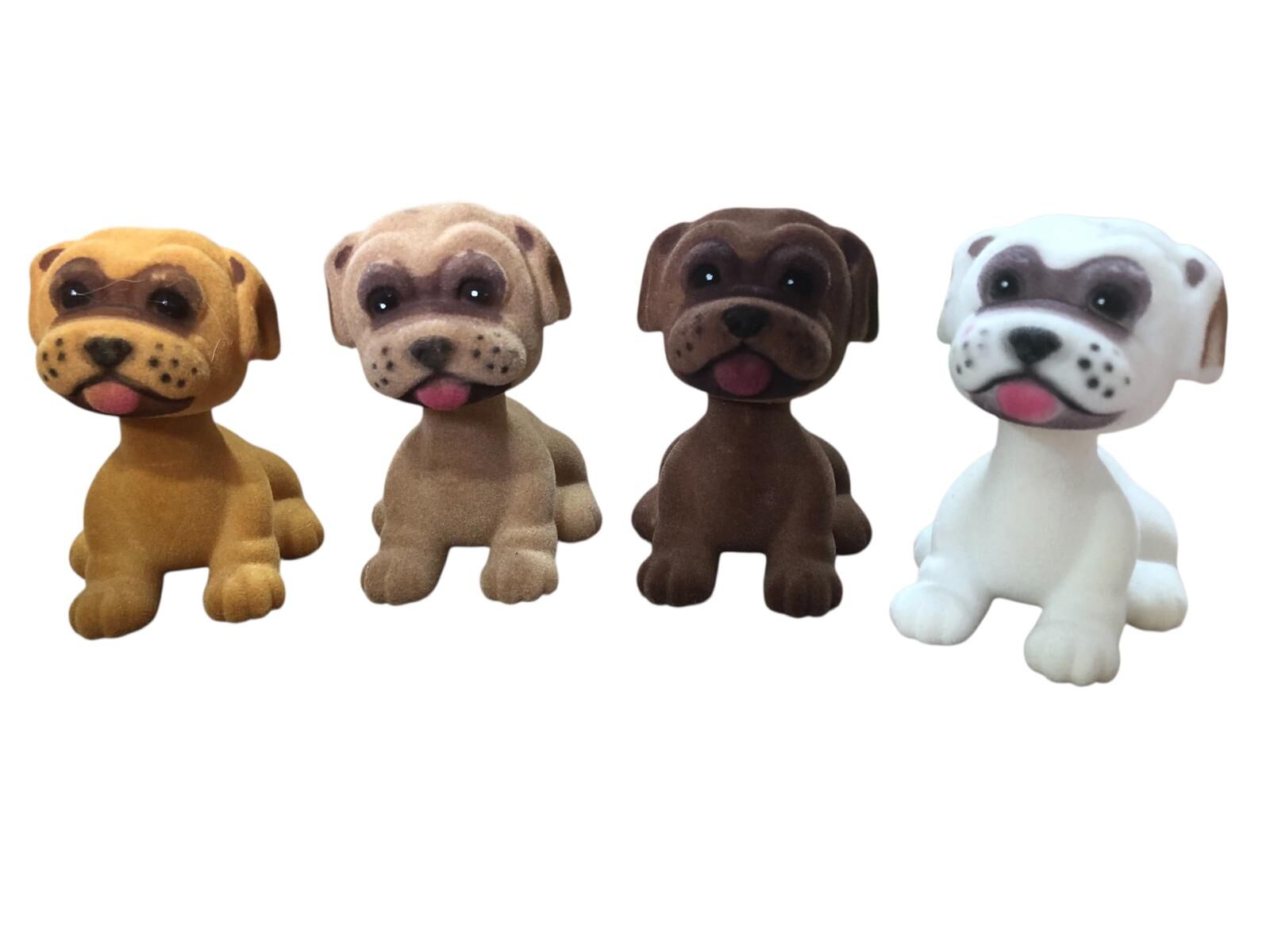 Oturan Kafasını Sallayan Köpek Biblosu